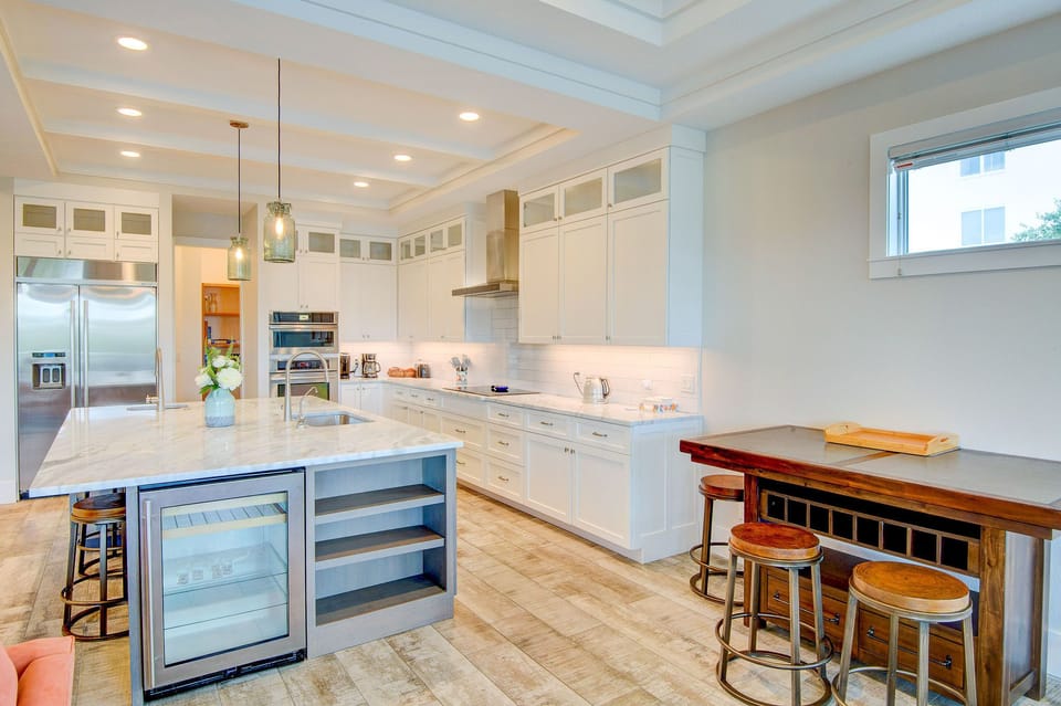 WINE/DRINK COOLER & EXTRA SEATING IN THE KITCHEN