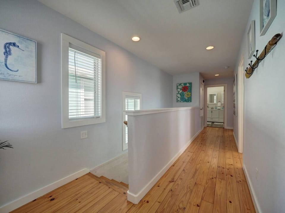 Upstairs has three bedrooms and two full bathrooms 