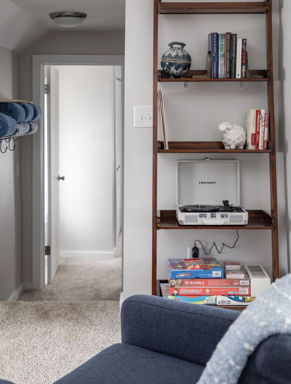 Games, retro record player and assorted books for your entertainment.