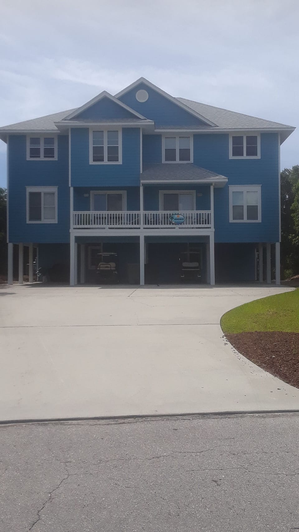 Our home, and your vacation retreat, is the left unit. Each side fits 3-4 cars.