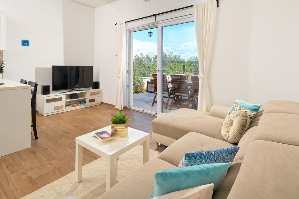 Villa, Pool Access, Partial Sea View | Living area | 107-cm flat-screen TV with digital channels, TV