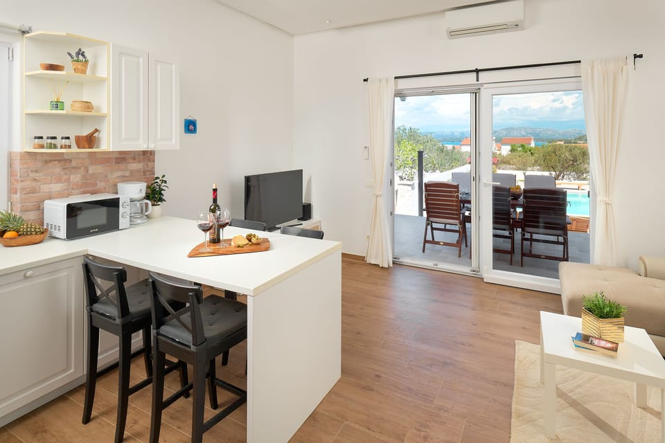 Villa, Pool Access, Partial Sea View | Private kitchen | Full-size fridge, microwave, oven, stovetop