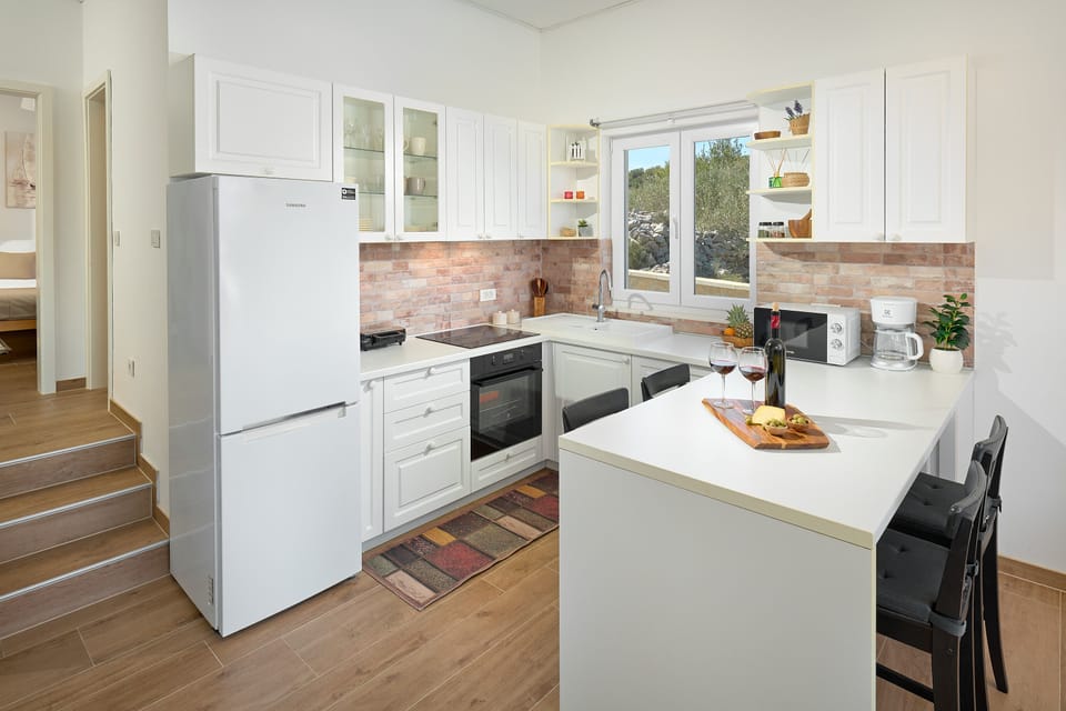 Villa, Pool Access, Partial Sea View | Private kitchen | Full-size fridge, microwave, oven, stovetop