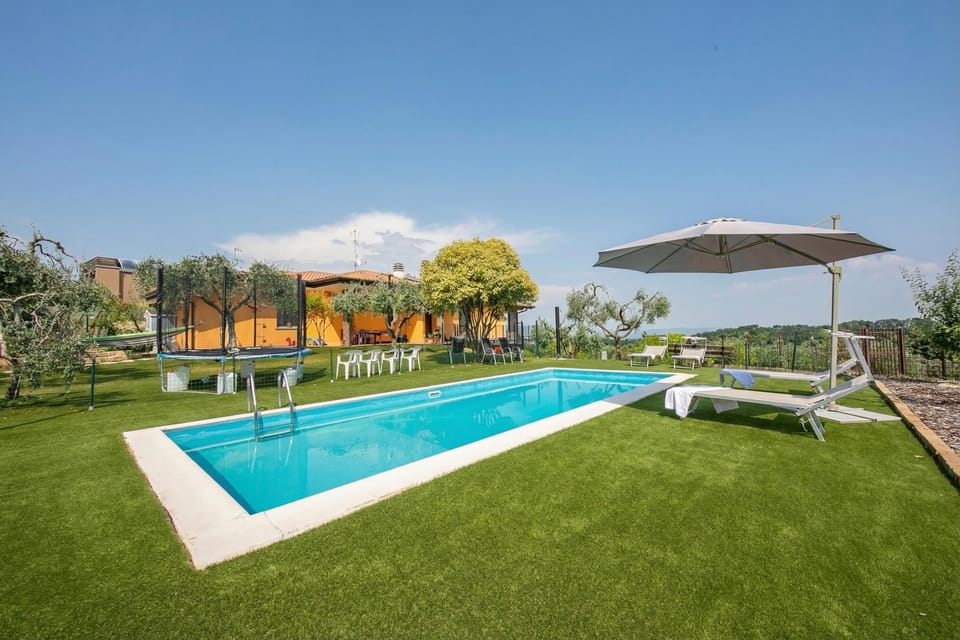 Family House, Multiple Bedrooms (Villa Teresa Apt Lake Garda View) | Pool | Seasonal outdoor pool