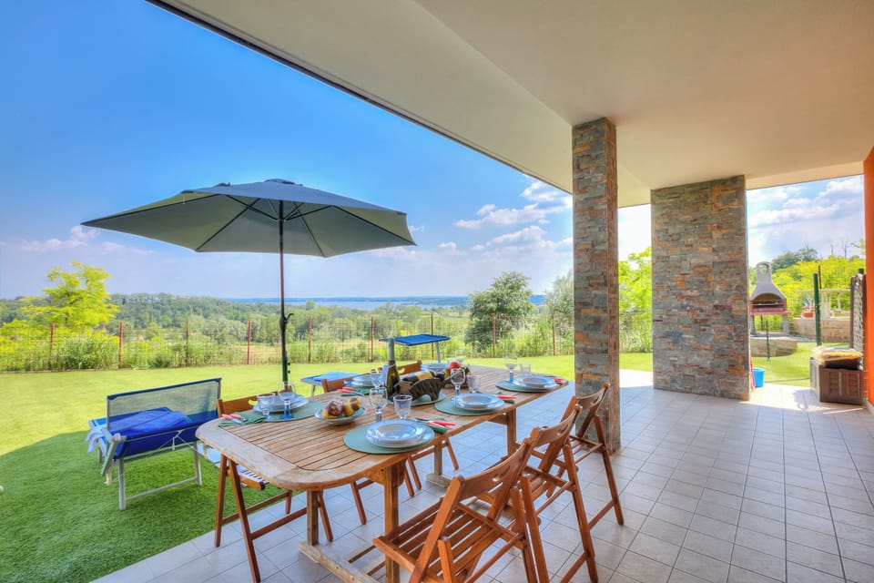 Family House, Multiple Bedrooms (Villa Teresa Apt Lake Garda View) | Outdoor dining