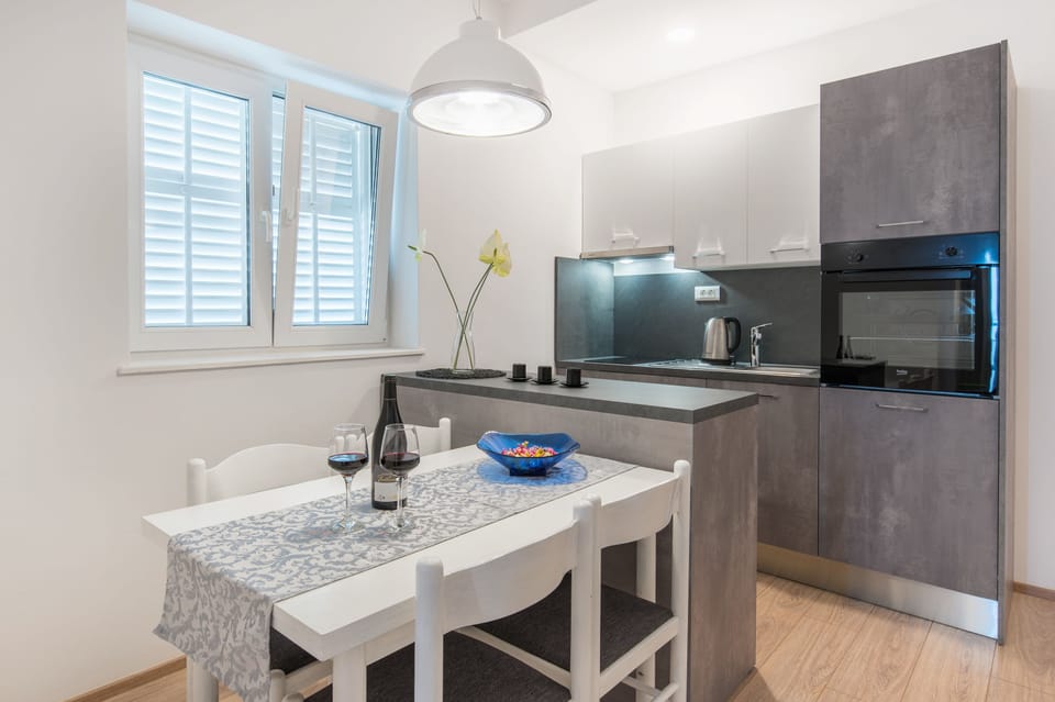 Comfort Apartment, 1 Bedroom, Balcony, Courtyard View | Private kitchen | Fridge, electric kettle, blender, cleaning supplies