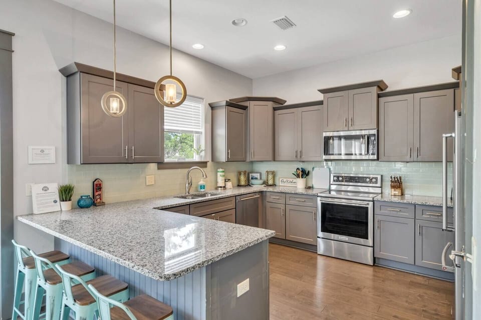 The kitchen is the heart of the home and this kitchen has plenty of room for the whole family!