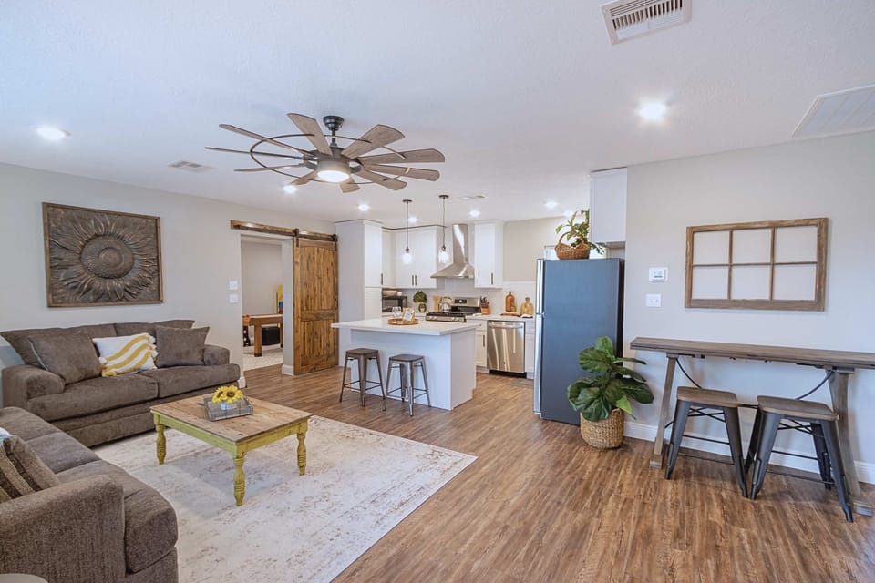 Living Room: Bright, airy space with comfy seating and modern touches—perfect for relaxing after adventures!
