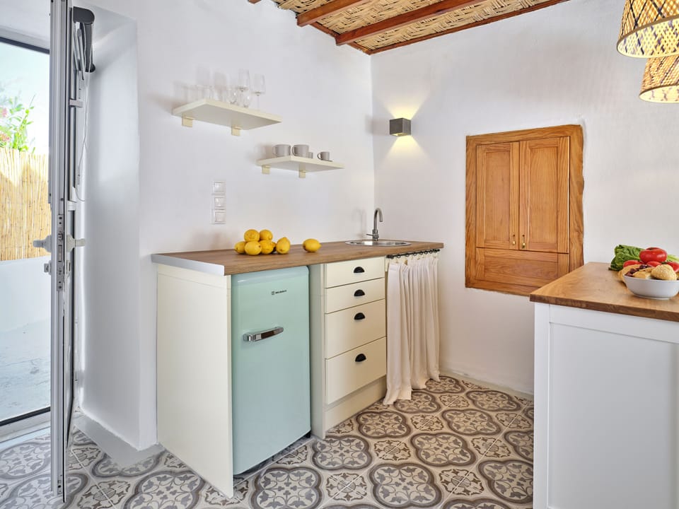 Traditional House, 1 Bedroom, Sea View | Private kitchen | Mini-fridge, coffee/tea maker, cookware/dishes/utensils, dining tables