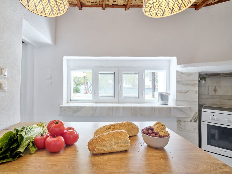 Traditional House, 1 Bedroom, Sea View | Private kitchen | Mini-fridge, coffee/tea maker, cookware/dishes/utensils, dining tables