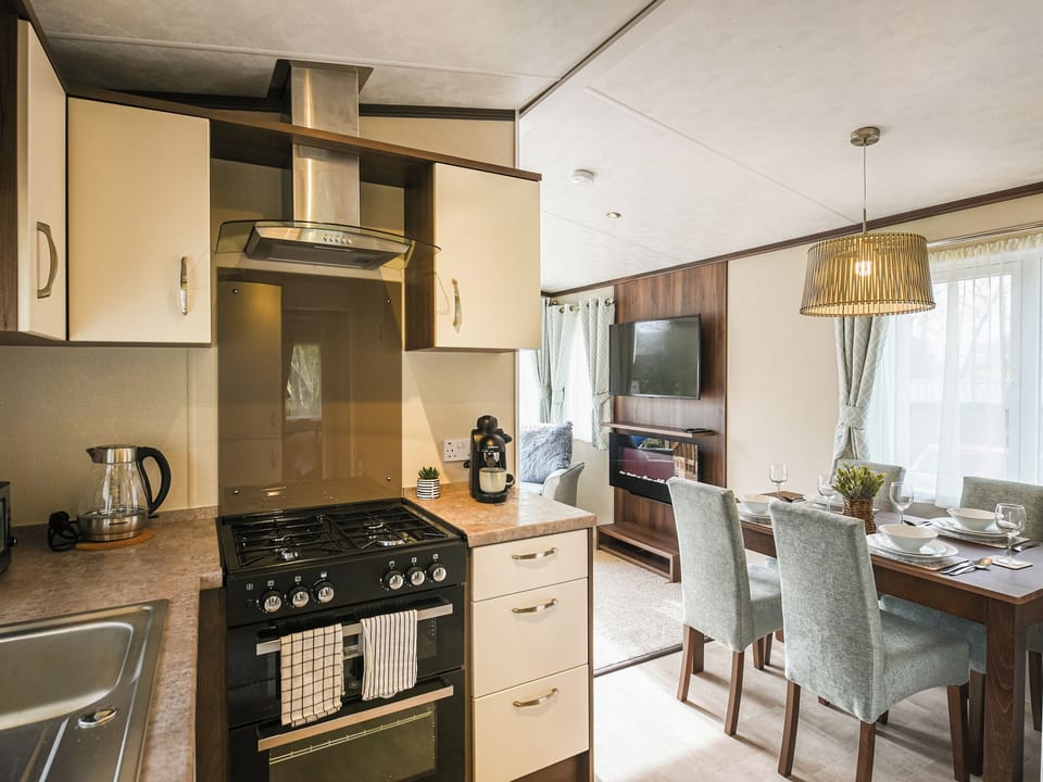 Kitchen area | Avon Lodge - Daisy Bank Touring Caravan Park, Montgomery