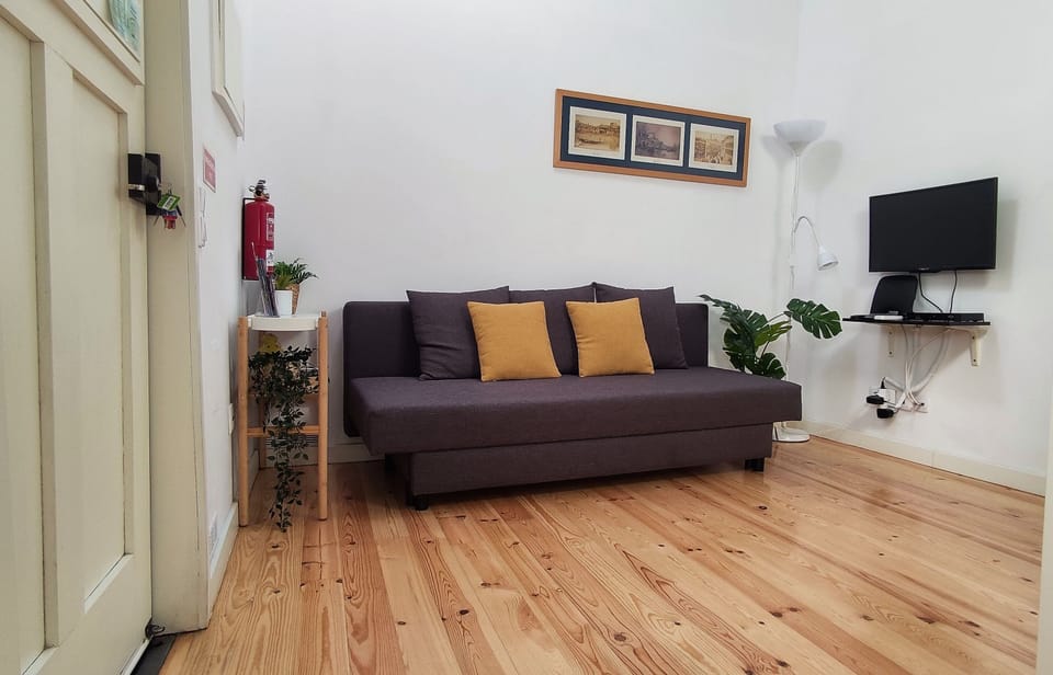 Sala de estar com sofá-cama
Living room with sofa-bed