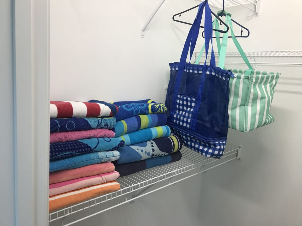 plenty of beach towels and beach bags