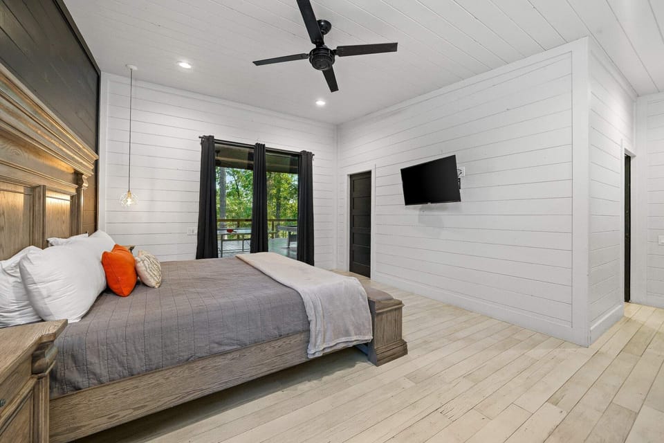 This bedroom offers a king bed and Smart TV.