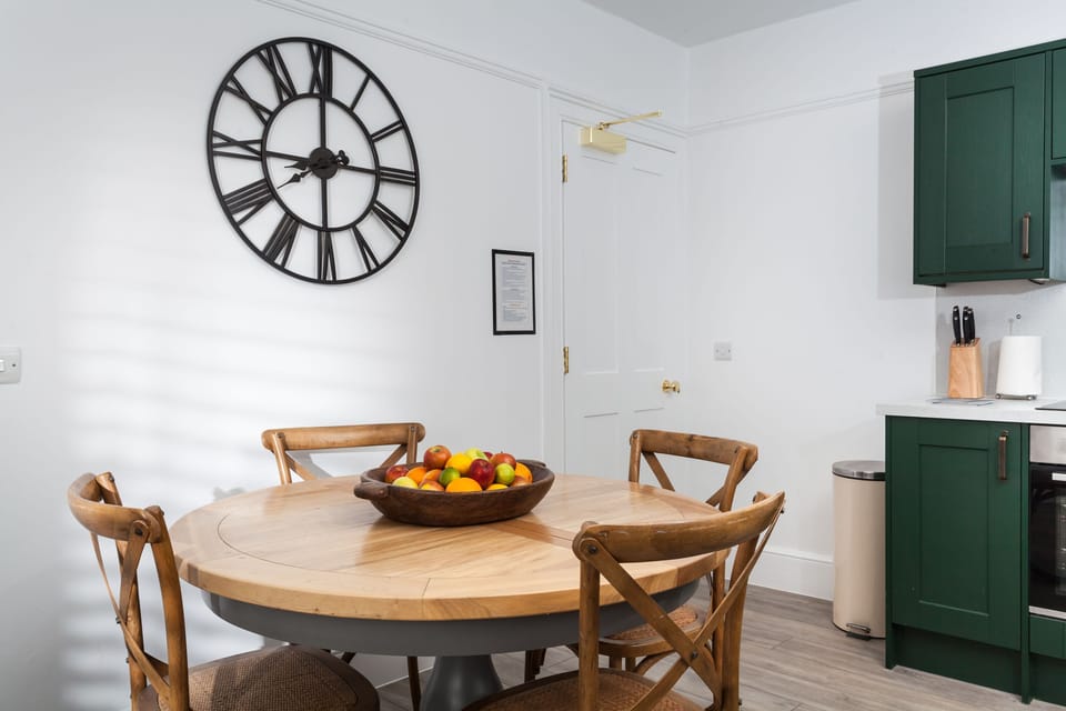 Enjoy a home cooked meal at the dining table in the kitchen