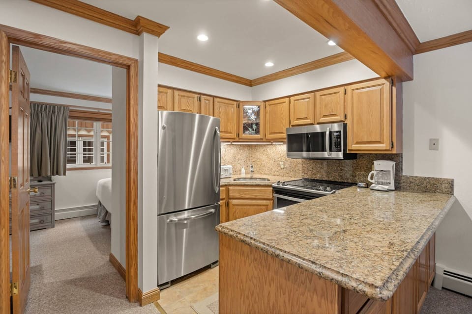 The kitchen is fully stocked with everything you need to enjoy dining at home during your vacation in Aspen.
