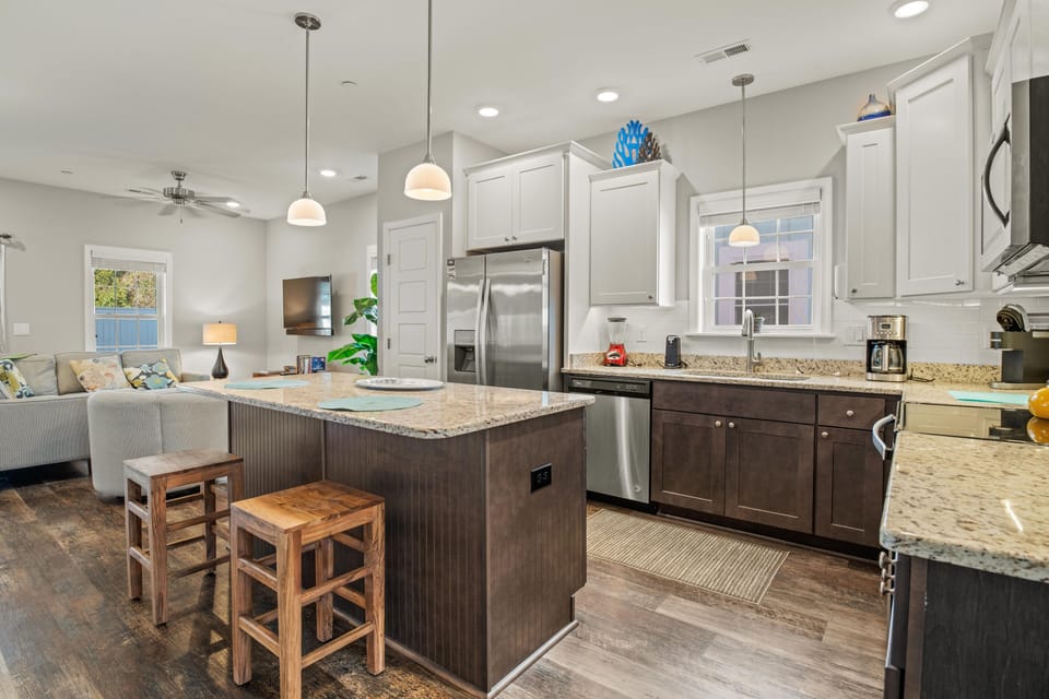 Kitchen with Bar Stool Seating on First Level