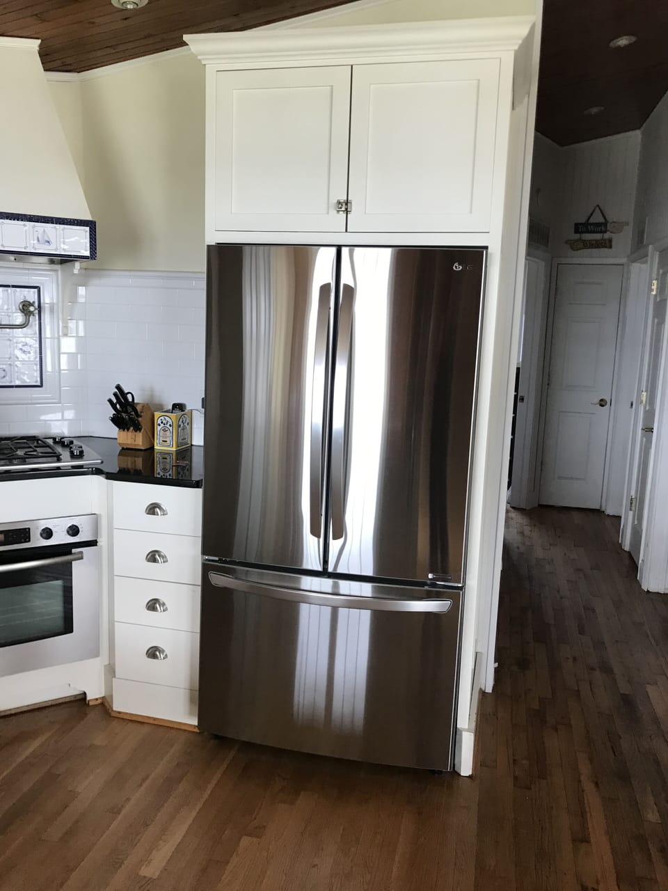 AND THERE'S ANOTHER FRIDGE IN THE LAUNDRY ROOM TOO!