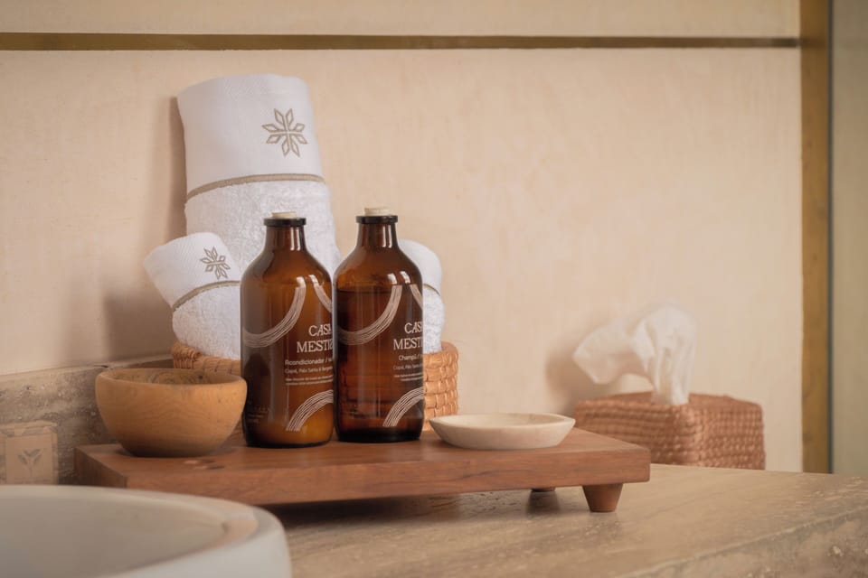 Shower, hair dryer, slippers, towels