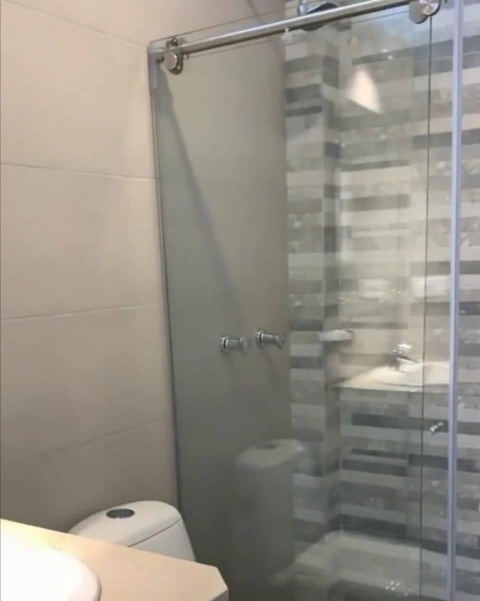 Shower, rainfall showerhead, heated floors, towels