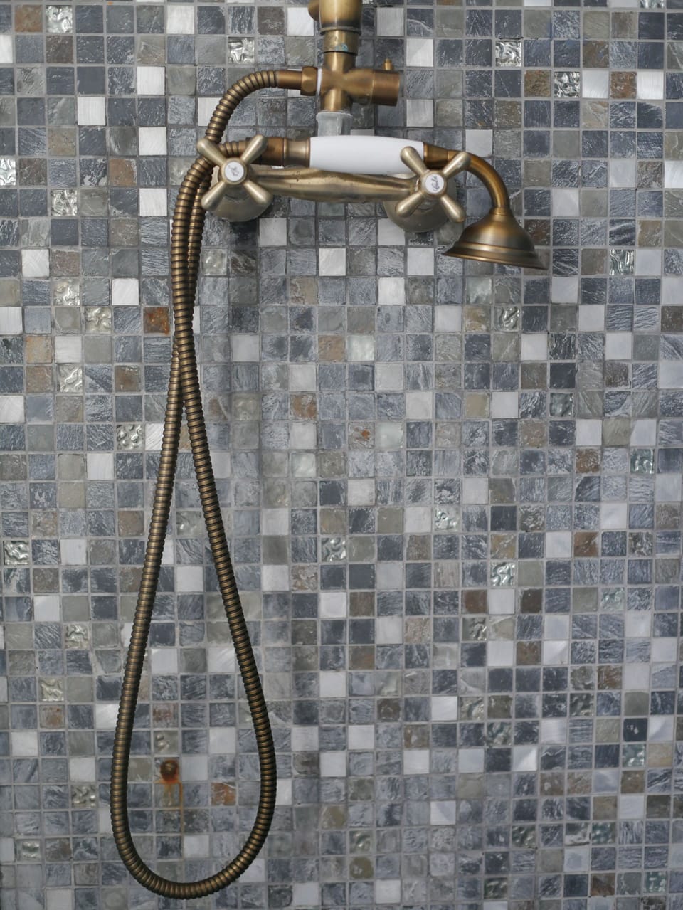 Shower, hair dryer, slippers, towels