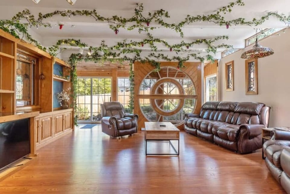 Relax in the living room on soft couches as you peer through the large circular windows that were rescued from the NCSU King center just as it was being demolished several decades ago.