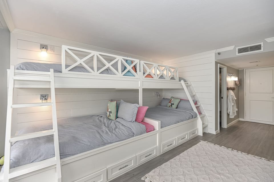 Guest room with built ins.  Queen on bottoms and twin on top!
