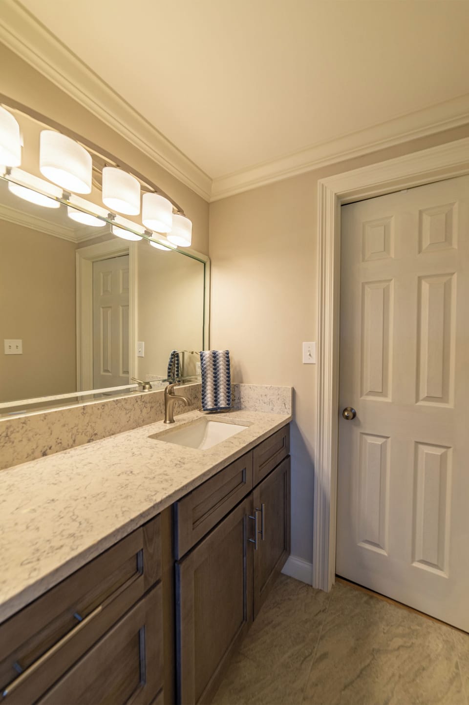 Plenty of room to get ready for a night out on the town in the main bathroom's separate dressing area.