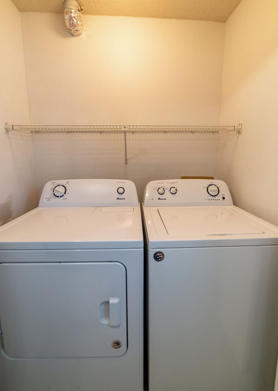 Full sized washer & dryer is located in the kitchen area.
