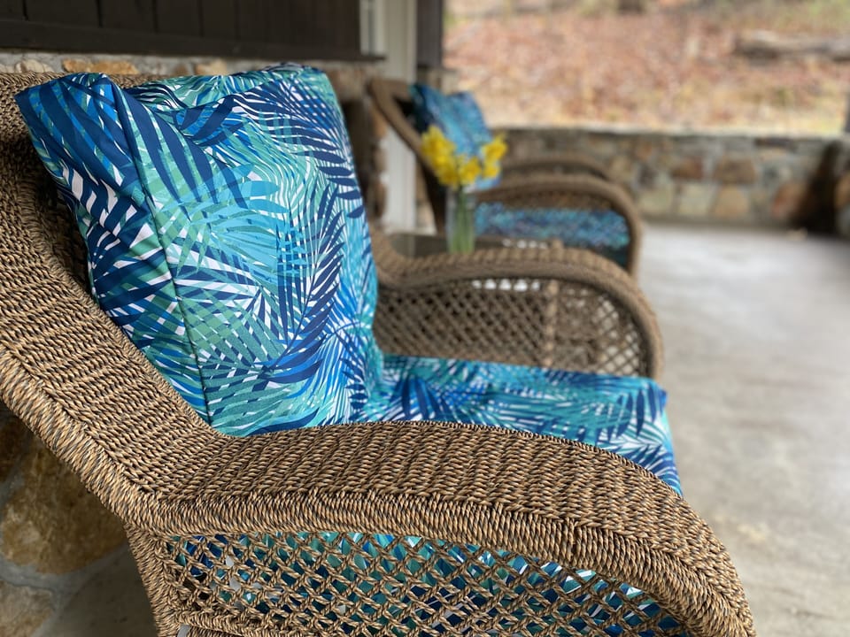 Back patio retreat is secluded but minutes away from town -view of early spring 
