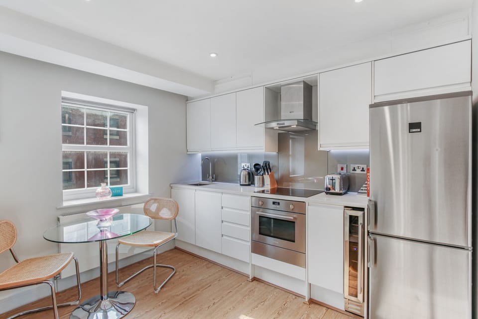 Apartment, 1 Bedroom | Private kitchen | Full-size fridge, microwave, oven, dishwasher