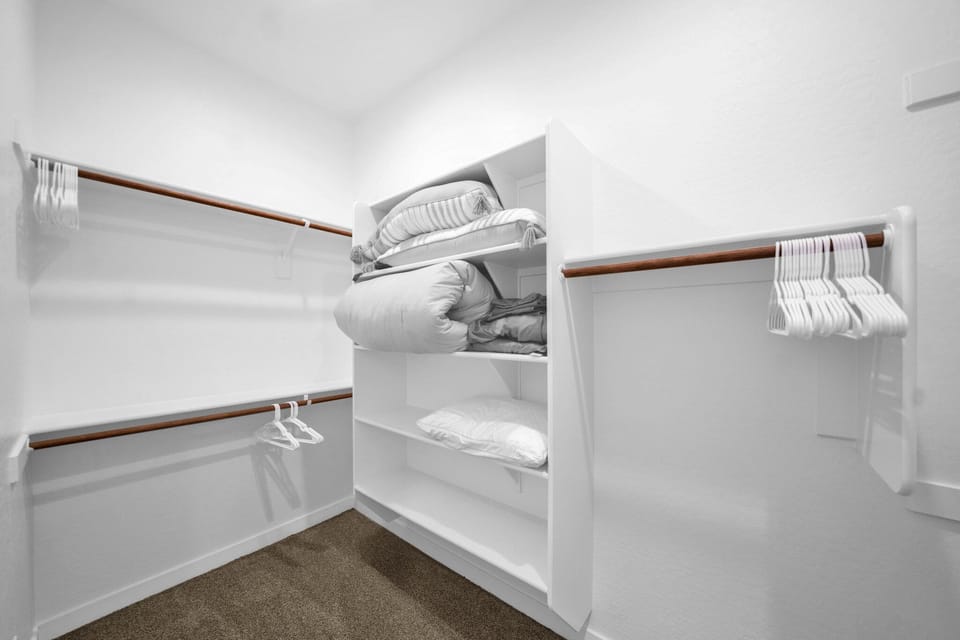 Large master walk-in closet. Extra linens and pillows in all bedroom closets.