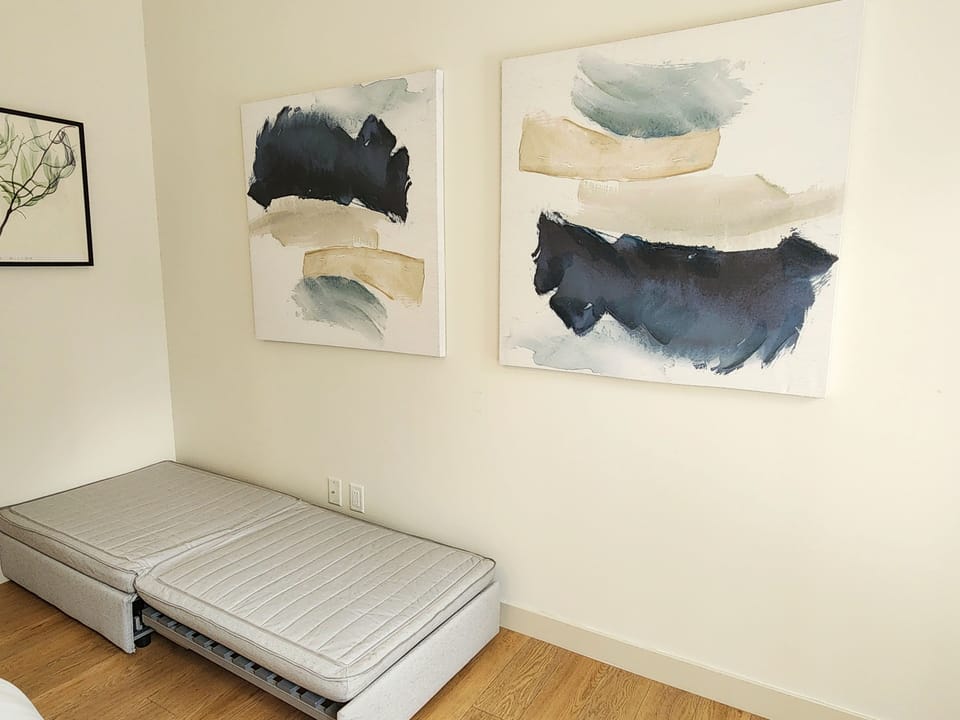 master bedroom with sleep ottoman(open up to twin bed)