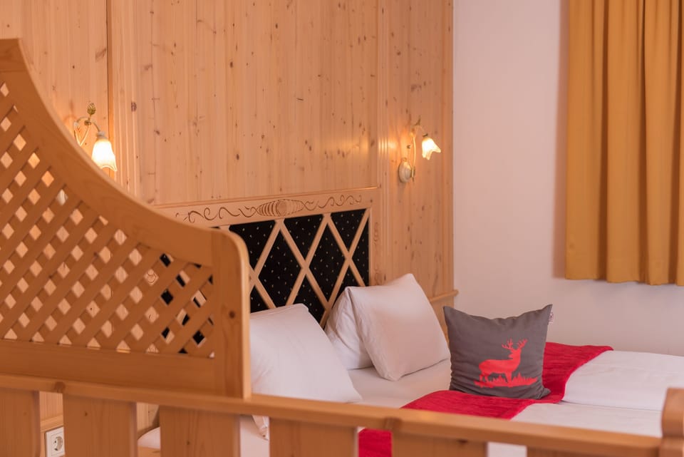 Desk, laptop workspace, free WiFi, bed sheets