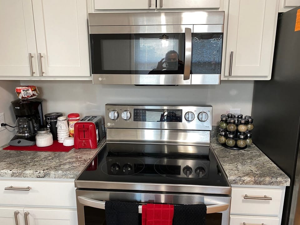 New Stainless Programmable Microwave  and Electric Range. 