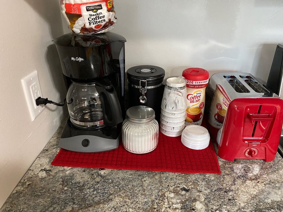 Kitchen appliances, coffee and condiments for our guests use. 