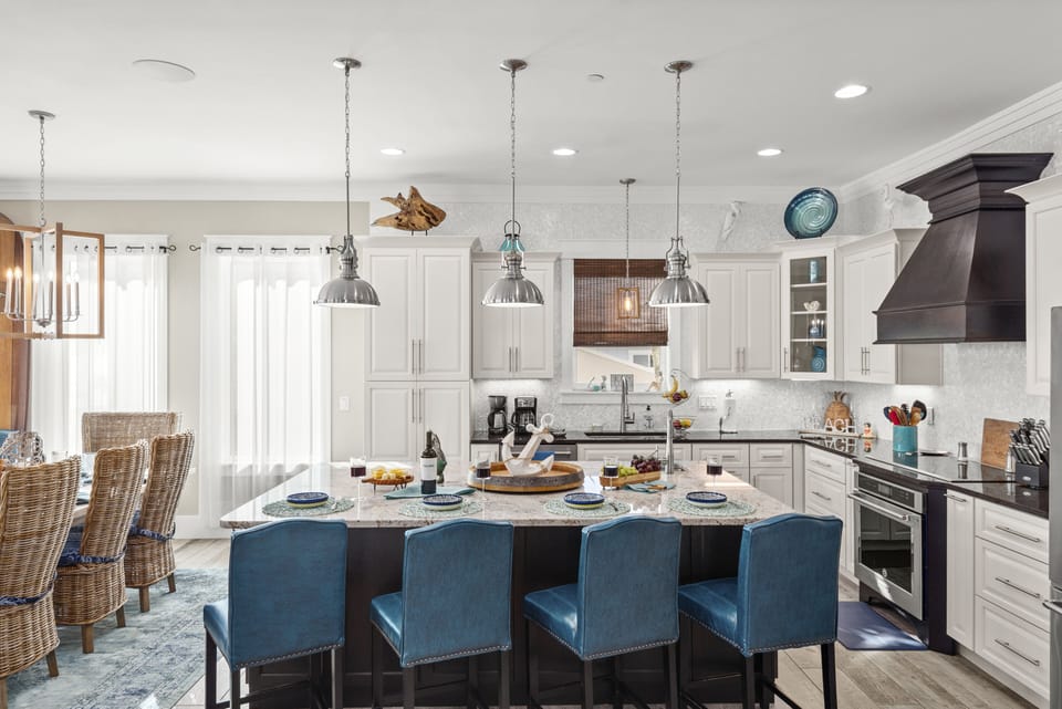 Fully equipped gourmet kitchen with island seating