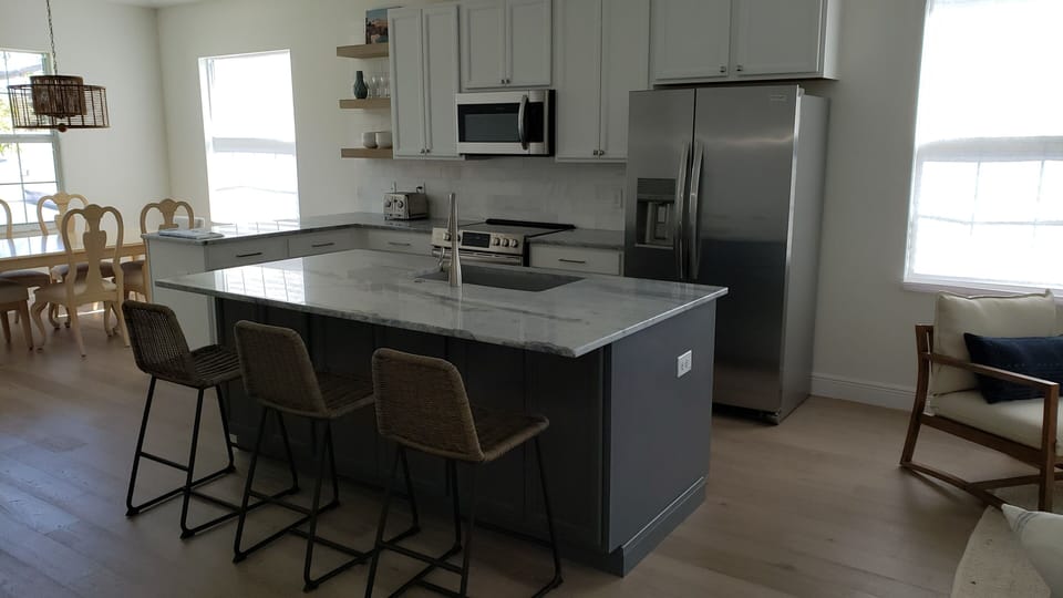 Guests can sit at the island while you are preparing gourmet meals