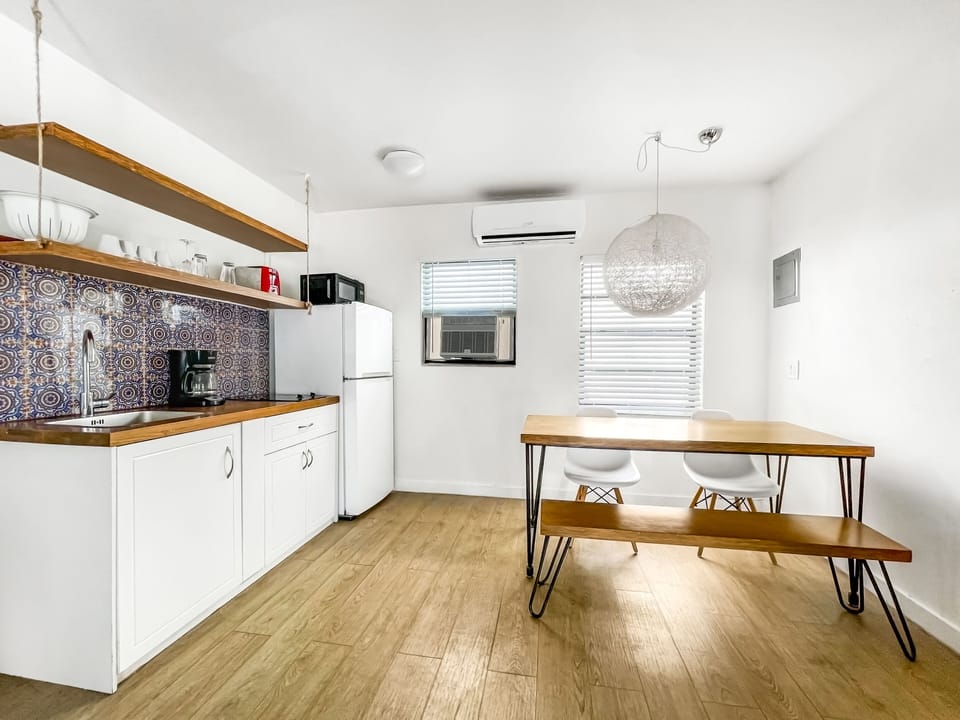 Apartment | Private kitchen | Coffee/tea maker, full-size fridge, microwave, stovetop