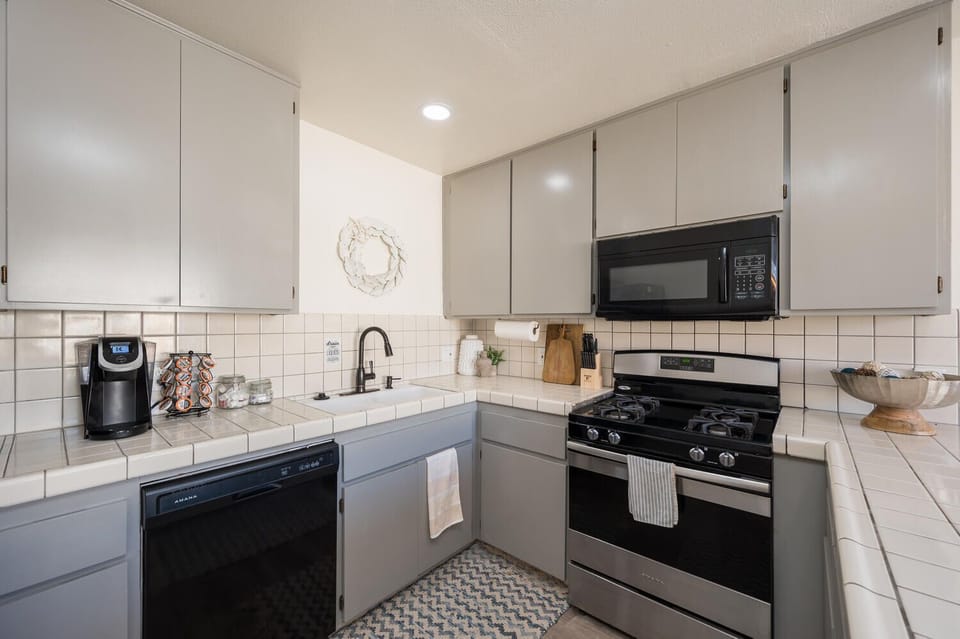 Keurig and fully stocked carousel, cream, and sugar:)