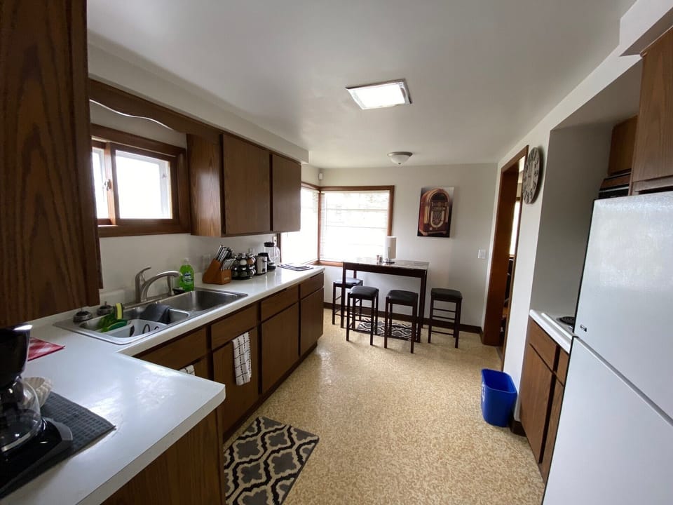 This spacious Newly remodeled kitchen is well stocked for the serious chef.