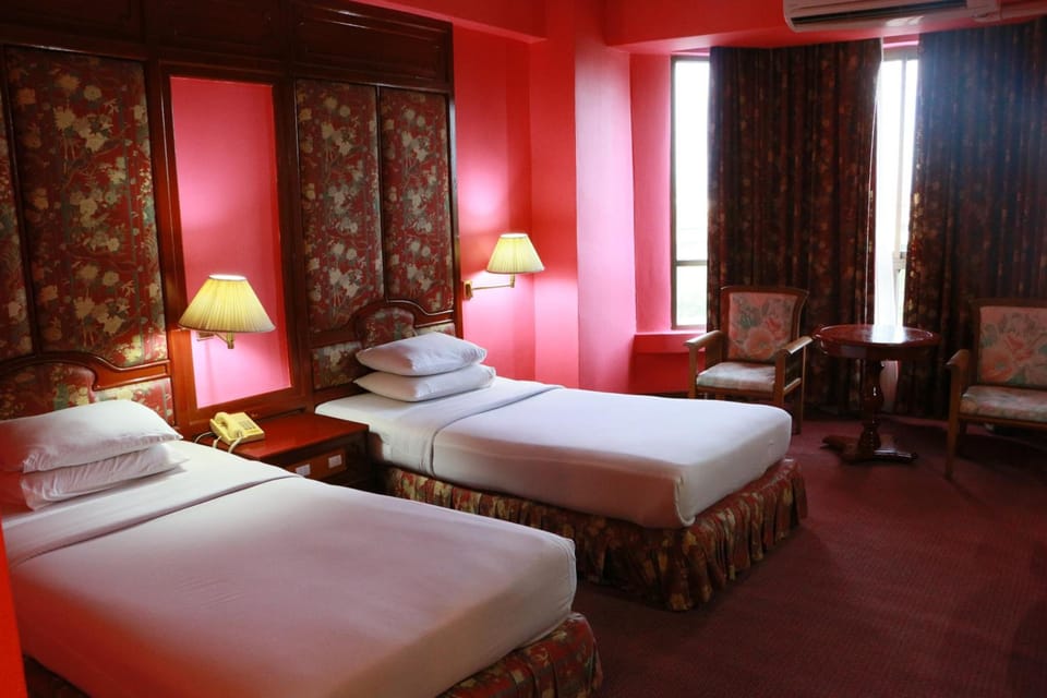 Desk, blackout drapes, rollaway beds, free WiFi