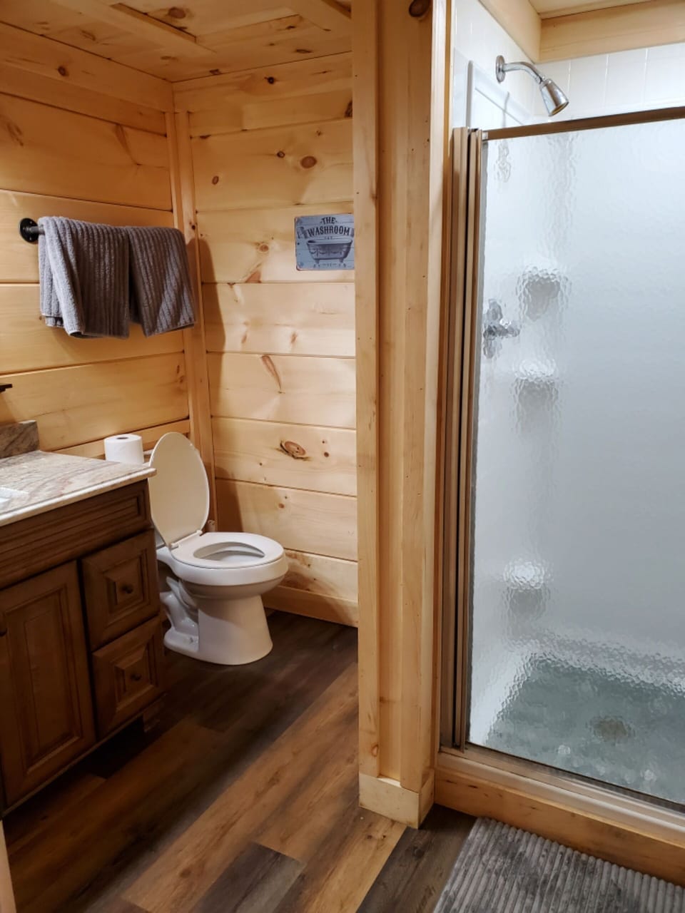 downstairs full bath with walk in shower
