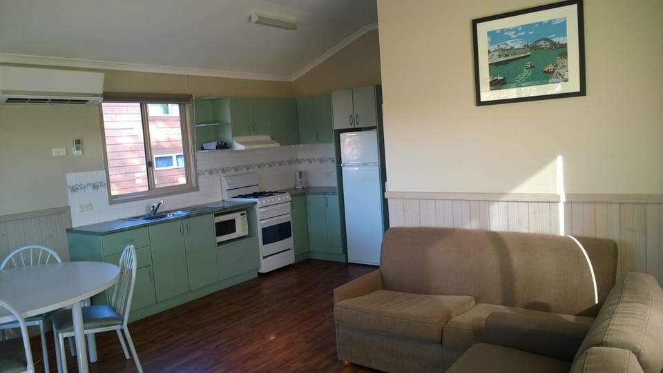 Spa Villa (1 King + 2 Bunk Beds) | Living area | LCD TV