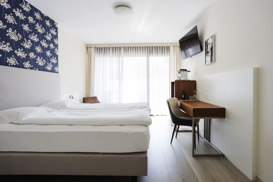 Superior Double Room | Down comforters, minibar, desk, laptop workspace