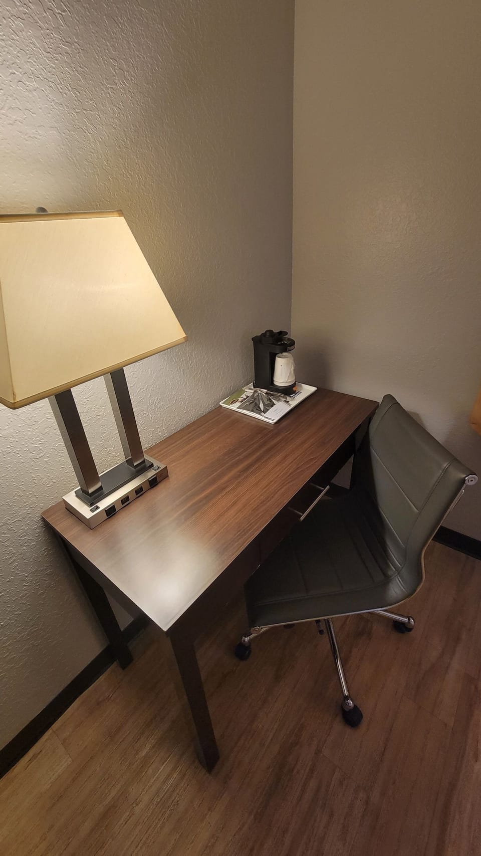 Desk, laptop workspace, blackout drapes, iron/ironing board