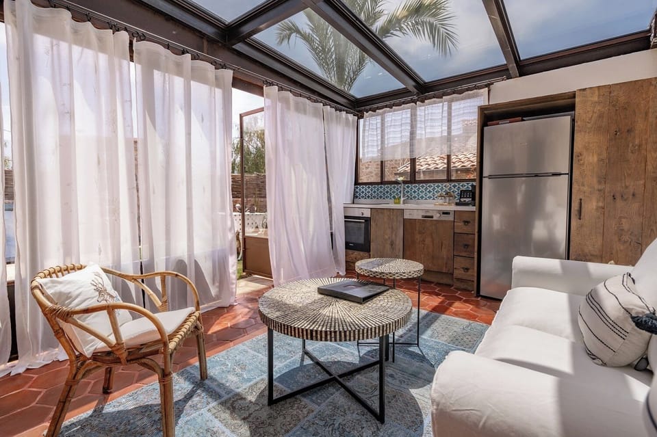 Villa Iris | Living area | 52-inch Smart TV with satellite channels, TV, Netflix