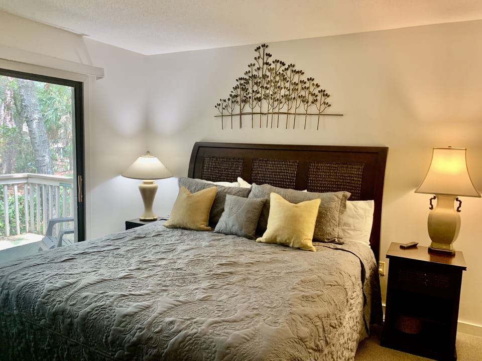 Primary bedroom with king bed and private bathroom.