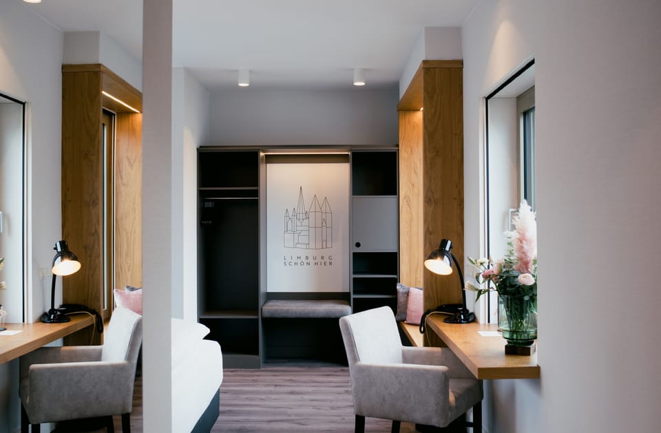 Panoramic Double Room | Living area | Flat-screen TV