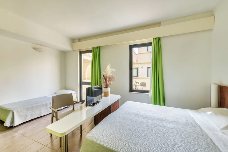 Minibar, in-room safe, blackout drapes, free WiFi